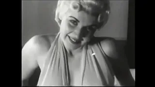 Sexy blonde takes off her underwear and shows beautiful breasts