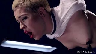 Short haired blonde slave set on wooden horse with all weight on her pussy gets vibrated