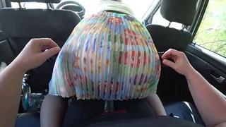 A girlfriend in the car fucked a lesbian with juicy booty under her skirt.
