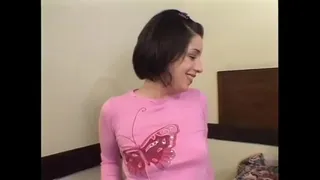 Slim brunette with small tits rides a hard cock on a big bed