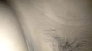 Deep in her sleep, he spreads her pussy open and fucks her with his cock until he cums all over her clit.