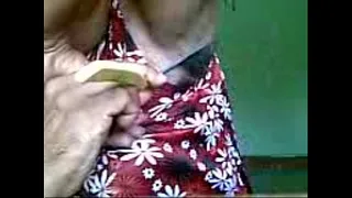 Neha shaving her armpits.