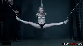 Small sub suspended with bondage before caning
