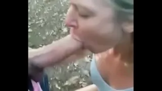 Cheating wife sucking cock outdoors
