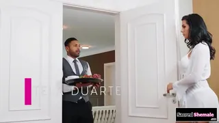 SacredShemale.com - Latina shemale Estela Duarte asks a bellboy to fuck her and the guy licks her feet.He gives the tgirl a bj and then the big tits trans barebacks him
