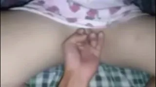 Spreading her pussy, beautiful Thai girl stuffs his cock in her clit.