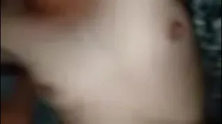 Spreading her pussy, beautiful Thai girl stuffs his cock in her clit.