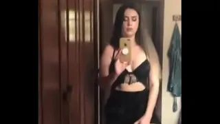 Very pretty transvestite films her dowry in front of the mirror of her house