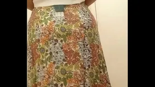 Latina tries on clothes at sears