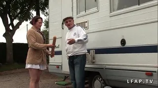 Serious redhead whore double penetrated in a gangbang with an old man