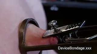 Bdsm babe arched back and kneeling on a Sybian