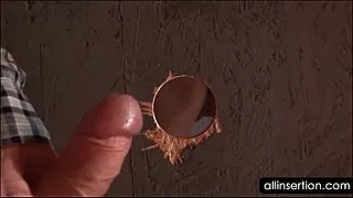 Bitch in stockings fucking dick on gloryhole