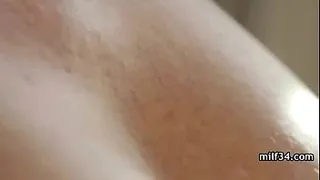 Big-breated horny milf's bedroom seduction