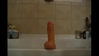 Dildoing her Cunt in the Bathroom