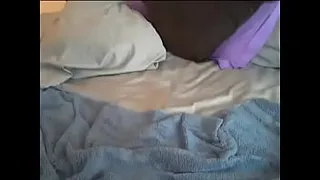 Girl putting a dildo in her ass