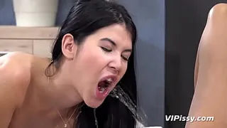 Exotic babes enjoy extreme pissing together