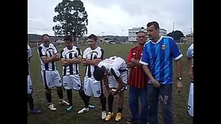 Wheel of players picking up the stick during training.