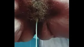 Granny with hairy pussy pees