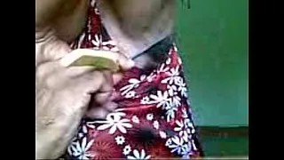 Neha shaving her armpits.