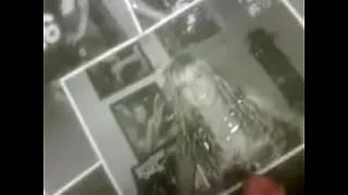 Guy watching porn and cumming on girls pics