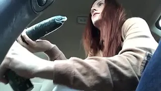 Cute Redhead shops for and uses cucumber