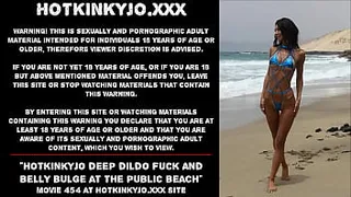 Hotkinkyjo deep dildo fuck and belly bulge at the public beach