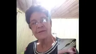 Old woman showing her chest and touching her pussy in live