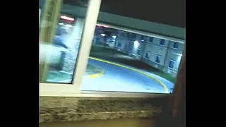 Getting my cock jerked while in the hotel window
