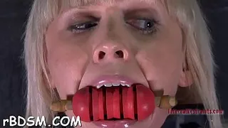 Gagged chick receives rough slit playing from