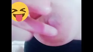 touching her nipple