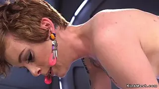 Babe fucks machine from bellow