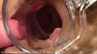 hot blonde opening up her pussy with a speculum with closeups