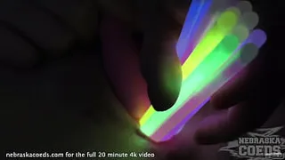 opening up teen pussy with glowsticks