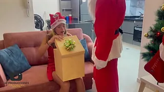 Santa Claus gives his huge cock and his delicious milk to a Latina girl as a Christmas gift.