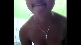 Brazilian girl taking a shower