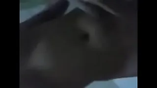 young girl sticking her finger in the chota