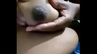 brunette delights sucks hard on her breasts until milk comes out