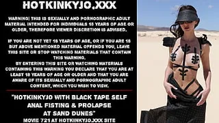 Hotkinkyjo with black tape self anal fisting & prolapse at sand dunes
