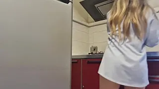 hottie cleans the stove and gets hot