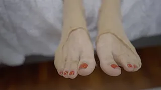 Foot fetish! Sexy blonde shows her feet in nylons and wants cum on them!