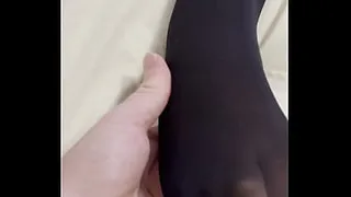 Getting my nylon covered feet rubbed..