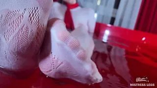 Mistress in white fishnet tights takes a bath and teases you with her ass and feet