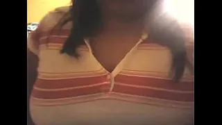 Aidee shows her breasts