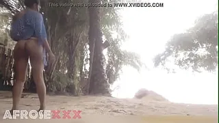 Black girl teasing on the beach