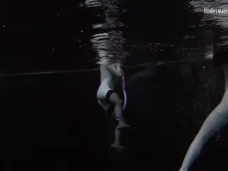 Naked Girls Swim Underwater