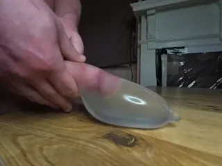 Water-Filled Condom Cumshot