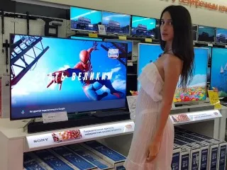 Girl Shows Pussy Selecting TV Store