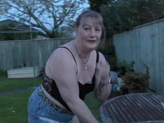 Kiwi Bitch Pisses in Backyard - Close-Up View