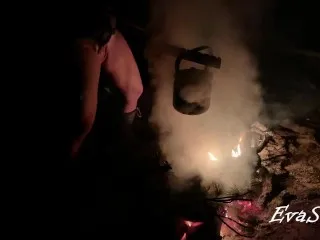 Standing MILF Urinates in Bonfire