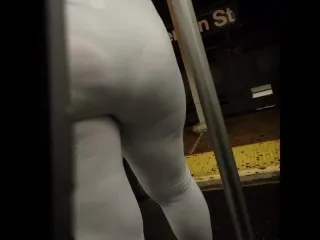 Big Latina Leaning Pole, See-Thru White Leggings on Train